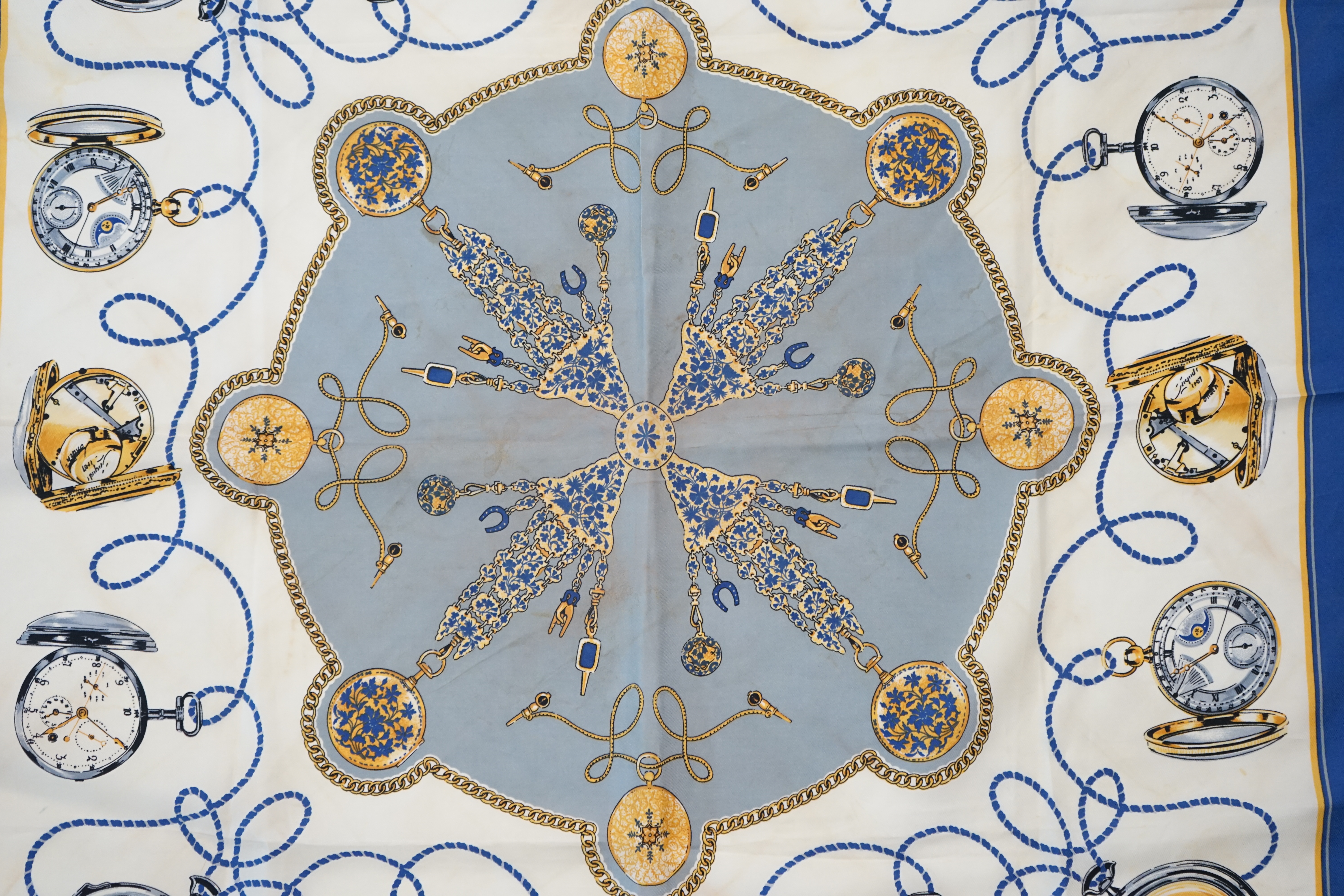 A Rolex blue sapphire statement silk scarf, approx 89cm x 89cm